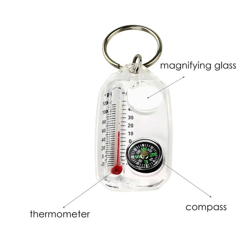 Rugged Portable Compass Keychain For Outdoors Go-To Direction Gear with thermometer and magnifying glass, durable ABS construction.