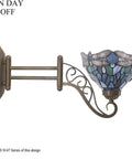 Side view of Tiffany Style Wall Sconce Plug In Swing Arm Light With Sea Blue Stained Glass Dragonfly Motif, Antique Green Bronze Base