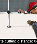 Person using Foldable Drywall Cutter Pro Tool For On Site Pros And DIYers Use With Adjustable Blade And Metric And Imperial Scale