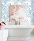 Bathroom with Peel And Stick Ocean Wave Wall Mural Hand Painted Blue And White Seamless Design next to a white bathtub.