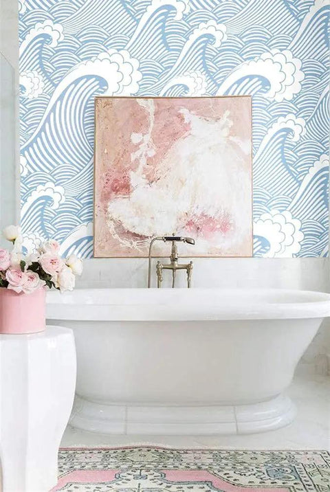 Bathroom with Peel And Stick Ocean Wave Wall Mural Hand Painted Blue And White Seamless Design next to a white bathtub.