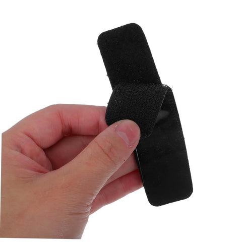 Super Strong Double Sided Hook And Loop Strips 100 Count Black Pet Film Fasteners With Sticky Back held in hand.