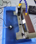 Knockout 600W Electric Knife Sharpener With Water Cooled Belt Sander And Variable Speed Wet Dry Grinder in blue water tank.