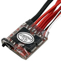Close-up of 30A Brushed ESC with Brake for DIY Mini RC Cars Boats Crawlers, showing wired connectors and quality control sticker.
