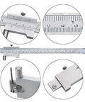 Rock Solid Eight Inch Stainless Scribe Calipers With Replaceable Carbide Tip and Utility Pouch, showing dual scale readouts and accurate markings.