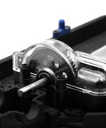 Close-up of installed Beefed Up Hardened Steel RC Car Spur Gear Set 60T 0.5M with 2.0mm 48DP pinion for 1/18 Traxxas LaTrax models.