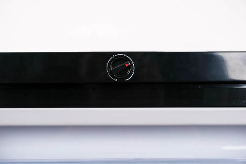 Control dial on the Spacious Upright Freezer Deep Freeze 11 Cubic Feet Stainless Steel Cabinet for temperature settings.