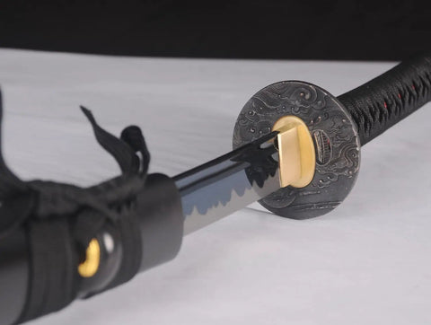 Close-up of Handmade Practice Katana For Iaido Training Full Tang Sharp Blade Japanese Samurai Sword with ornate tsuba.