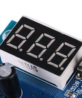 No Sweat Battery Charge Control Module With Crisp Digital Screen showing voltage readings, designed for easy six to sixty volt charging.