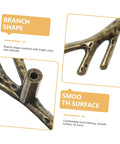 Close-up view of branch shape cabinet knobs from Branch Shape Cabinet Knobs 4 Piece Set for Cabinets and Drawers Dressers Cupboards and Closets Easy Open Vintage Style Furniture Handles Decorative Hardware for Kitchen and Home Renovations, showing gold finish and smooth surface.
