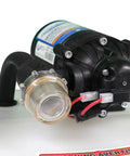 Close-up of pump unit from 25-Gallon Deluxe UTV And ATV Spot Sprayer With 2.2 GPM Pump, 70 PSI Max, showcasing connectors and wiring detail.