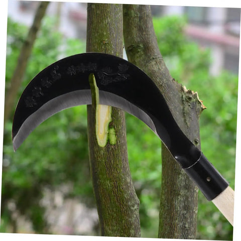 Long Handle Manganese Steel Hand Scythe for Weeding and Gardening with a comfy grip, shown cutting branch, black blade