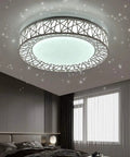 Dimmable Flush Mount Ceiling Light With Remote, 45W 18.9 Inch LED Fixture, lit in bedroom showing star pattern effect