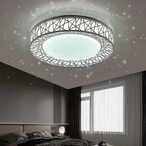 Dimmable Flush Mount Ceiling Light With Remote, 45W 18.9 Inch LED Fixture, lit in bedroom showing star pattern effect