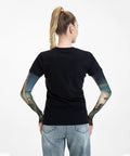 Gonna Need These Badass Arm Sleeves Featuring Heavy Duty Sun Block And Thorn Proof Shielding Hella Comfy Fingerless Design For Tough Yard Work Or Trail Runs Moisture Wicking Daily Driver on woman with hair in ponytail