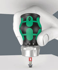 Hand using Kraftform Kompakt Stubby Ratchet Screwdriver With Bit Magazine, 6 Piece Set in a tight space