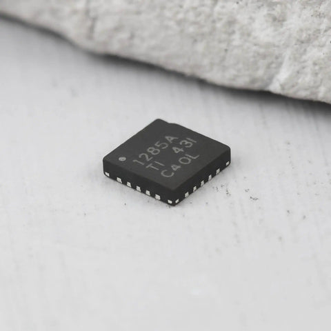 Close-up of a 20-pin TPS51285ARUKR power IC chip, high frequency, low power, for electronic projects and devices.