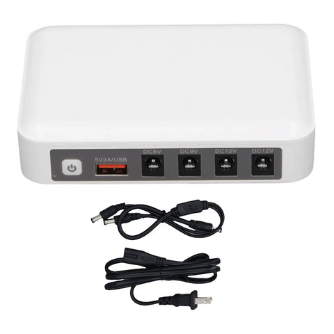 Solid Mini Ups With Six Thousand Mah Battery To Keep Your Wifi Router And Modem Running Smooth Through Power Blackouts And Internet Downtime Without A Hitch At Home Or Office. White compact UPS with USB and multiple DC outputs.