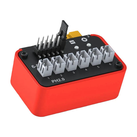 Red Six Port Battery Charging Hub With BT2.0 And PH2.0 Connectors For Rechargeable Iron Cells Up To 2.0A Output, top view.
