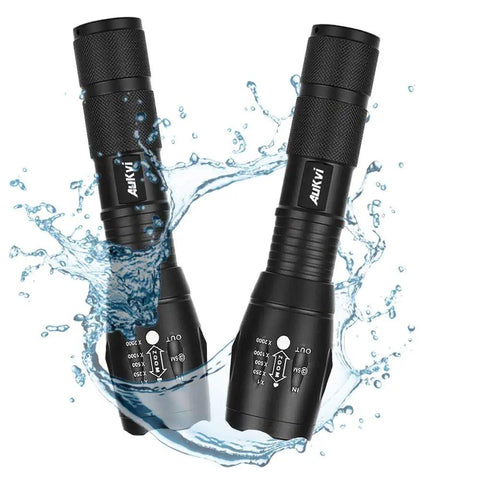 670nm Red Light Flashlight One Mode Long Range Zoomable For Hunting And Night Observation, in water splash, compact black design.