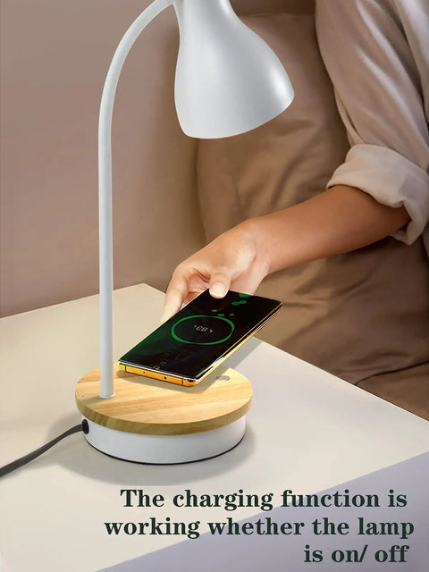 Metal Desk Lamp With Fast Wireless Charging Pad And USB Ports, Arc Table Light in use with charging phone, white finish