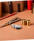 Heavy Duty Marine Pulley Blocks Four Pack With Stainless Steel Bearings beside tools, on a workbench.