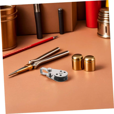 Heavy Duty Marine Pulley Blocks Four Pack With Stainless Steel Bearings beside tools, on a workbench.