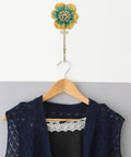 Sweet Vintage Flower Wall Hooks That Are Dang Handy For Hanging Coats Keys And Kitchen Towels Without Taking Up Valuable Space Plus The Rustic Design Looks Totally Legit In Any Room with navy vest