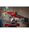 Person using Beast Mode 18 Volt Fuel Lithium Ion Brushless Cordless 10 Inch Dual Bevel Sliding Compound Miter Saw Kit With Free 9Ah Battery.