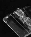 Clear Acrylic Small Folding Hinges 10 Pack For Jewelry Boxes And Display Cabinets shown in close-up view
