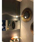 Teardrop Crystal Pendant Light With Gold Brushed Brass Finish One Light Mini LED Fixture Glass Globe Ceiling Pendant in room.