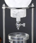 Premium Cold Brew Drip Tower With Adjustable Flow Control Borosilicate Glass Carafe showcasing ice in holder and drip valve.