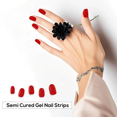 Semi Cured Gel Nail Strips Kit 20PCS for DIY Manicure in red on a hand with black flower ring