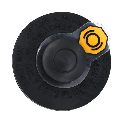 Top view of Brake Fluid Reservoir Cap For Toyota Vehicles Fits Camry Corolla 4Runner Tacoma Highlander RAV4 Avalon Yaris Prius MR2 Spyder Mirai And More Durable Easy Install Engine Bay Accessory showing yellow lock icon