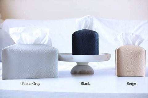 Tissue Box Cover Holder With Bottom Velcro Belt, Square PU Leather Decorative Organizer in beige, black, and pastel gray on display.