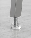 Close-up of threaded leveling leg from 40 Piece Adjustable Furniture Feet For Desk And Chair, PVC and metal, with clear bumper.