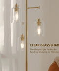 Close-up of Dope Gold 64 Inch Tree Floor Lamp With Three Branches And Glass Shades, showcasing clear glass shades.