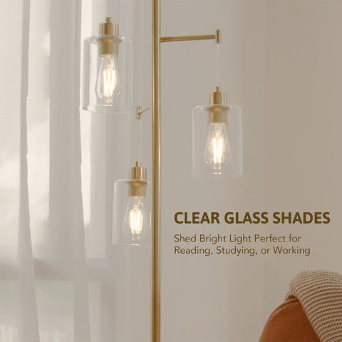 Close-up of Dope Gold 64 Inch Tree Floor Lamp With Three Branches And Glass Shades, showcasing clear glass shades.