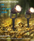 Low Voltage 5W LED Landscape Lights Warm White 12V 24V Waterproof Outdoor Spotlights illuminating garden with aluminum structure.