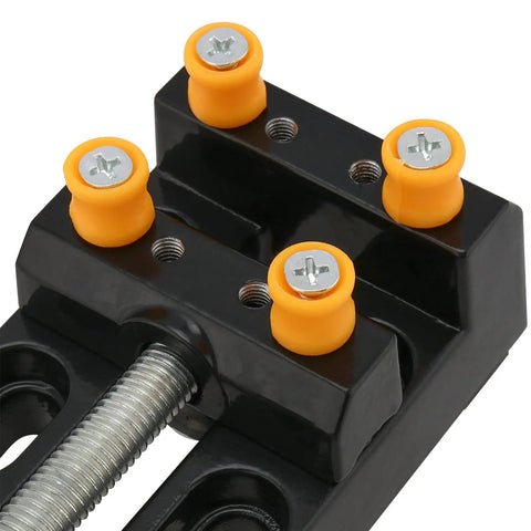 Close-up of Four Piece Mini Bench Vise Clamp Set with adjustable table vise for drill press, jewelry making, watch repair projects.