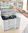 Person opening Sys3 Combo M Drawer Systainer With Front Access In A Tower Pro Grade Tool Organizer on workbench