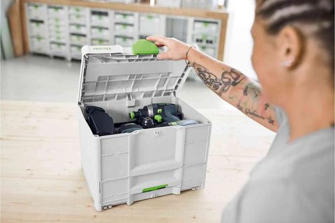 Person opening Sys3 Combo M Drawer Systainer With Front Access In A Tower Pro Grade Tool Organizer on workbench