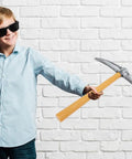 Child holding foam pickaxe from Two Piece Foam Pickaxe And Shovel Props For Mine Cosplay Party Decor Lightweight Plastic And Sponge Stage