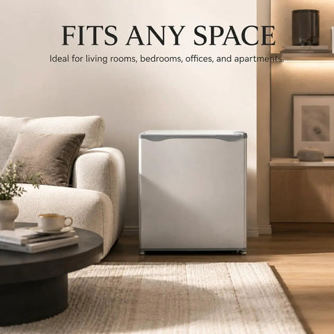 1.1 Cu Ft Compact Mini Freezer Solid Upright Build Slides Right Into Tight Dorm Rooms Or Offices Storing Meats Fresh Fish And Ice With Zero Hassle Cooling Tech next to a couch in a living room.