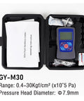 Digital Fruit Hardness Tester Penetrometer For Apples Pears Grapes Oranges in a black carrying case with instructional manual.