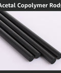 Ten Half Inch Black Acetal Copolymer Round Rods 12 Inch Long Bulk Pack Non Marring Fixture Ready POM Plastic Rods For DIY Projects Machining Prototyping And Crafting, four black rods shown