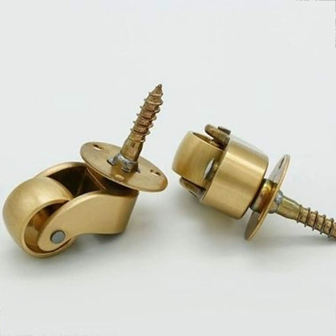 Premium Polished Brass Swivel Casters With 22 mm Wheels And 360 Degree Rotation showing two brass casters with screws.