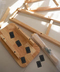 Stainless Steel Straight Joining Plates 6 Pack Heavy Duty Flat Wood Brackets For Furniture Repair And DIY Woodworking Easy Screw In Installation High Load Bearing And Secure Mounts on wooden tabletop.