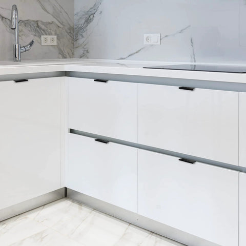Modern kitchen with 6 Pack Finger Edge Pulls For Cabinets 80mm Length Matte Black Concealed Cabinet Handles installed on white drawers.