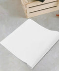 Self Adhesive Kitchen Backsplash Shield And Heat Resistant Clear Plastic Film Wrap For Cupboards on a smooth surface.